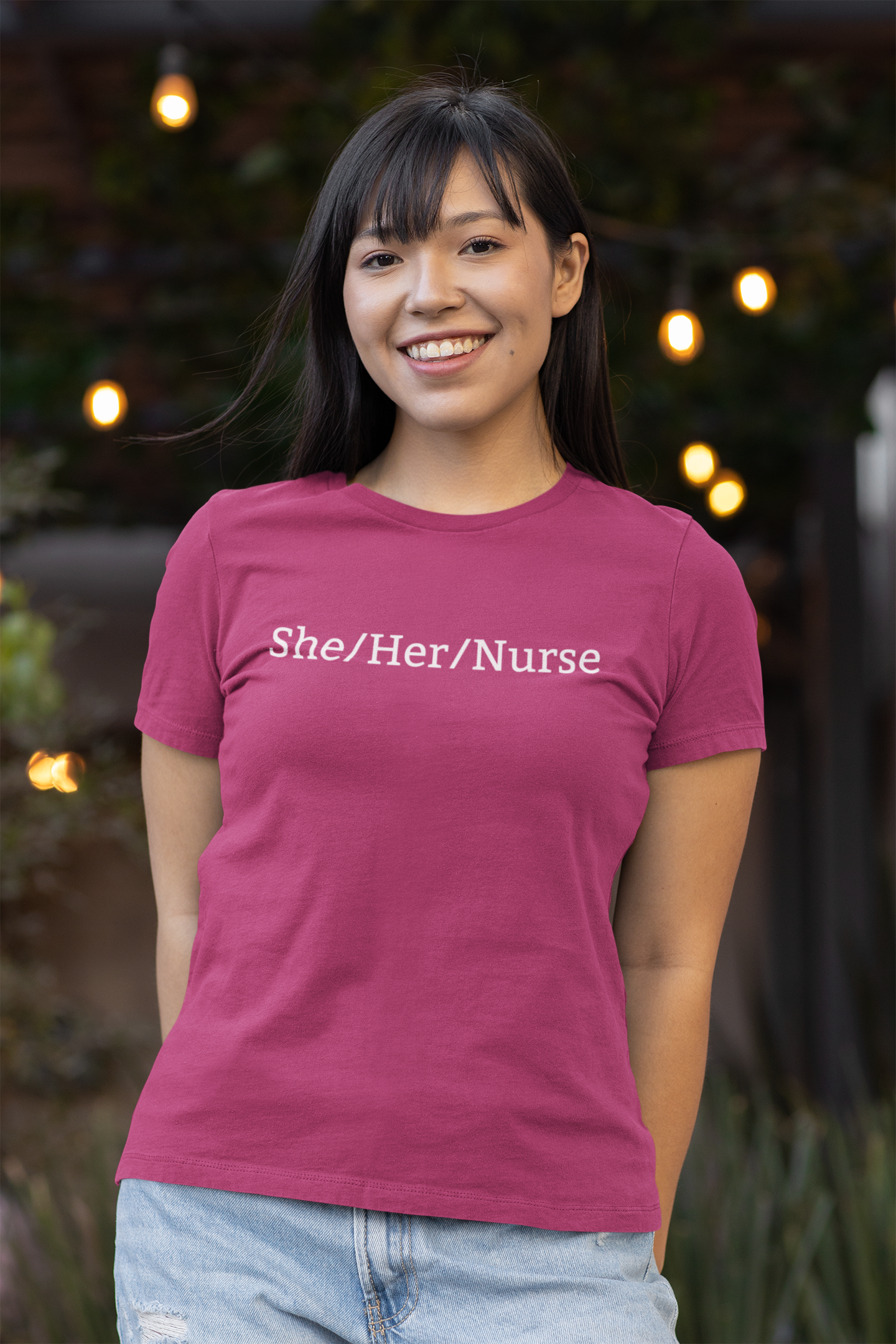 She/Her/Nurse Unisex T-Shirt Modeled in Berry